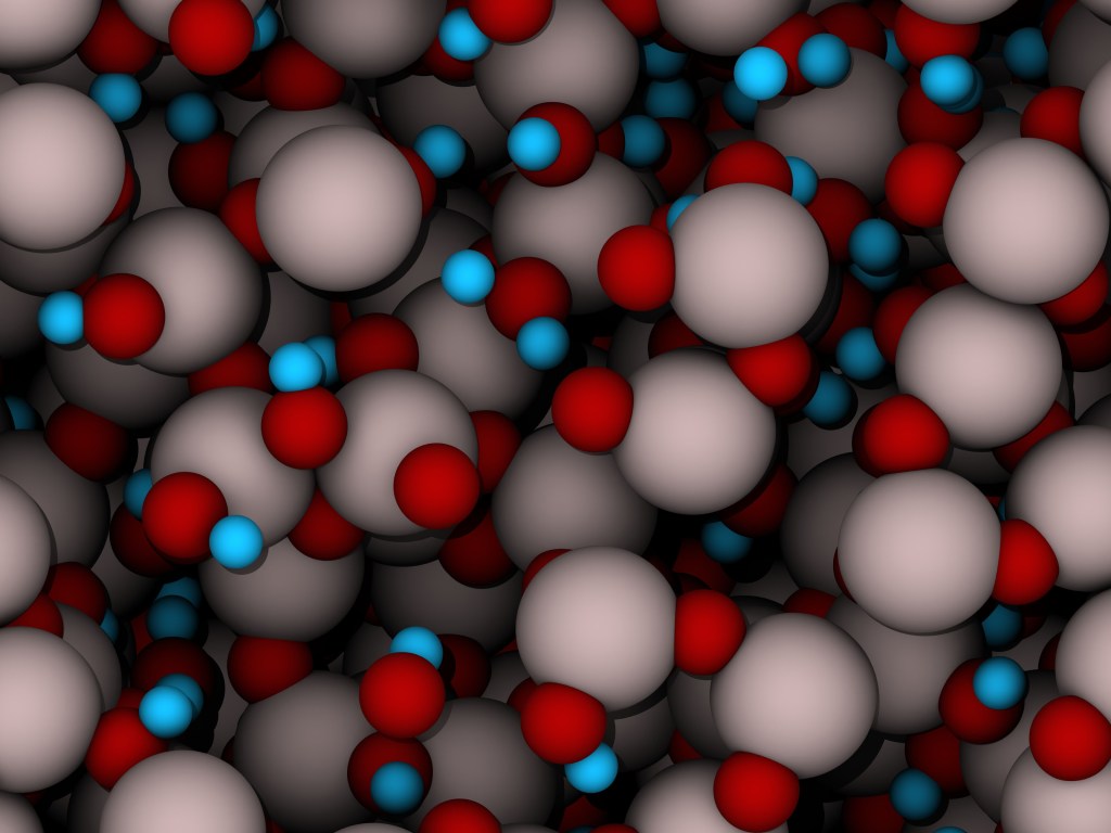 Die Aluminium-Atome (grau) und die Sauerstoffatome (rot) liegen im amorphen Aluminiumoxid nicht in einer geordneten kristallinen Form vor. (Wasserstoffatome: blau). Credits: Empa
