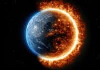 Earth shown in space with a bright ring of fire around its illuminated edge, blending blue glow on the left and fiery orange on the right, suggesting destruction or transformation.
