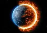 Earth shown in space with a bright ring of fire around its illuminated edge, blending blue glow on the left and fiery orange on the right, suggesting destruction or transformation.